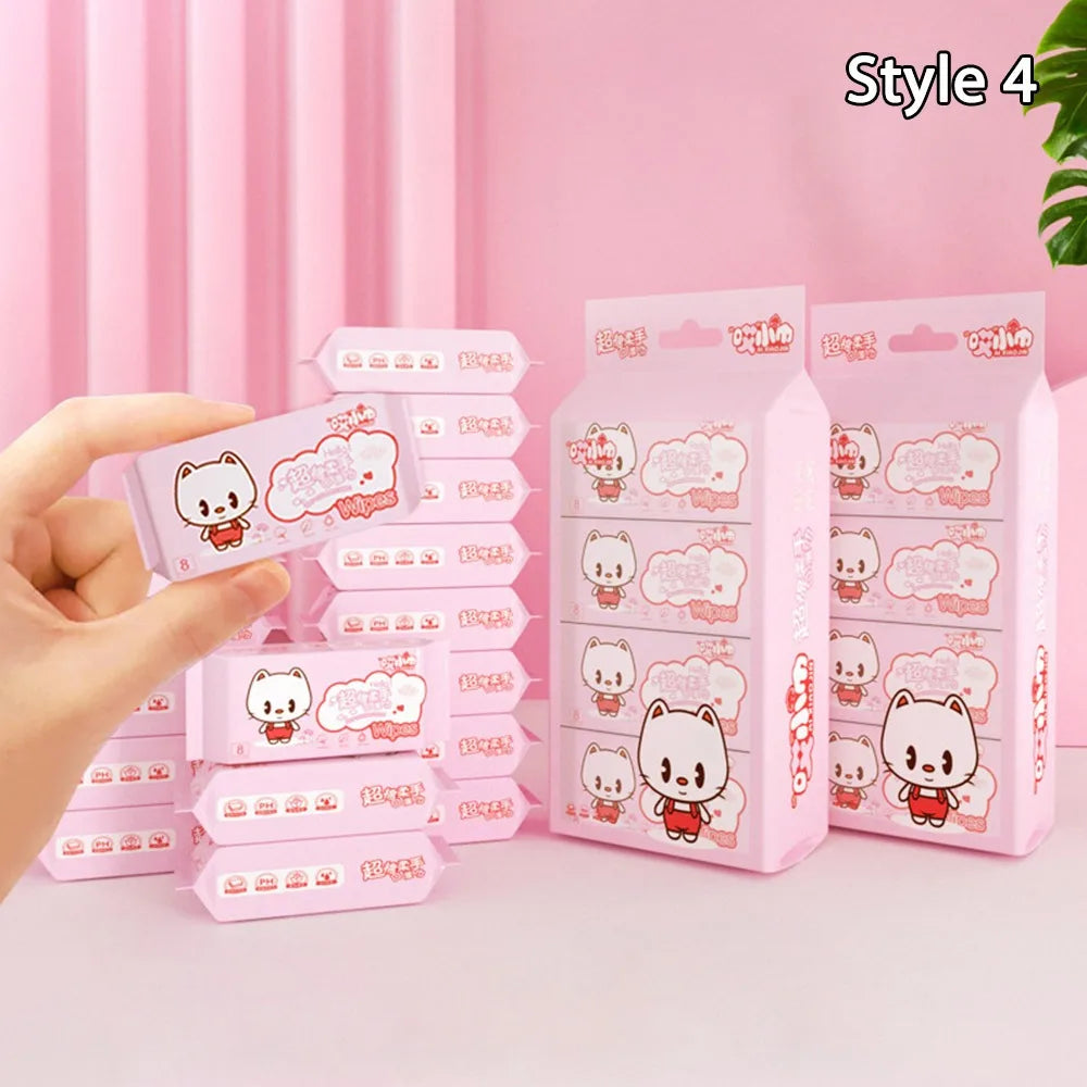 Cute kitty design baby care wet wipes in portable travel-size packs, pink packaging, ideal for gentle baby skin.