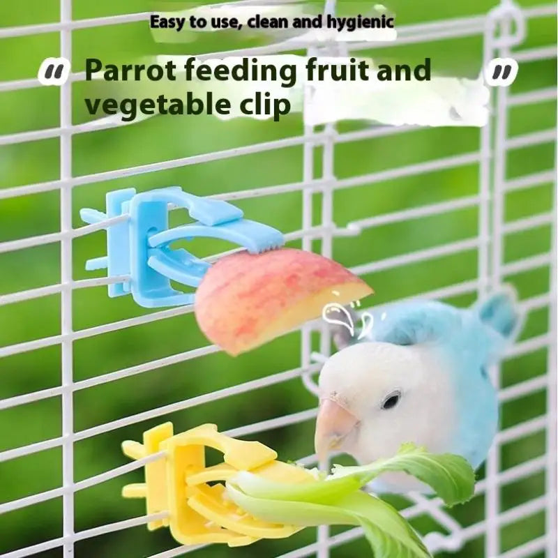Blue and yellow plastic bird cage clips holding fruit and vegetables for a parrot to eat easily.