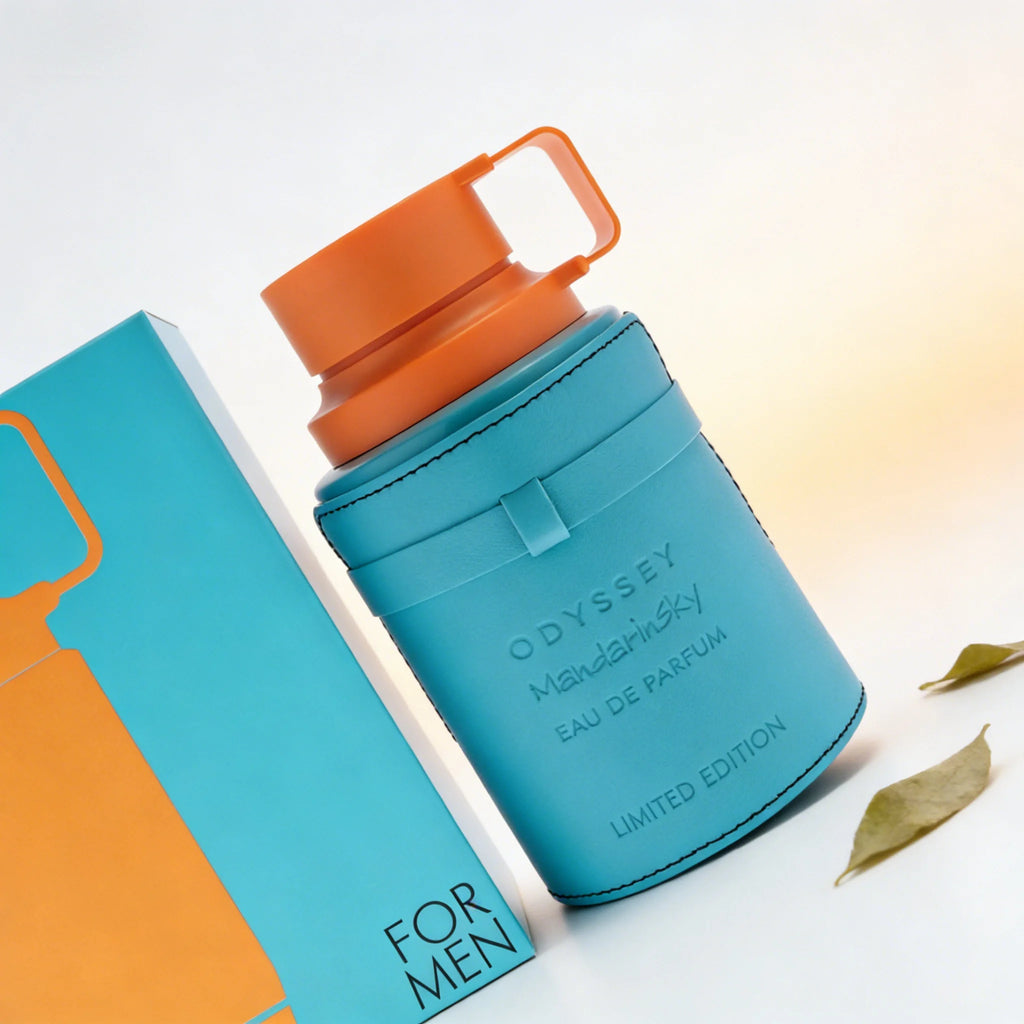 Armaf Odyssey Mandarin Sky EDP for men: orange-capped blue bottle, woody mandarin fragrance, limited edition cologne.