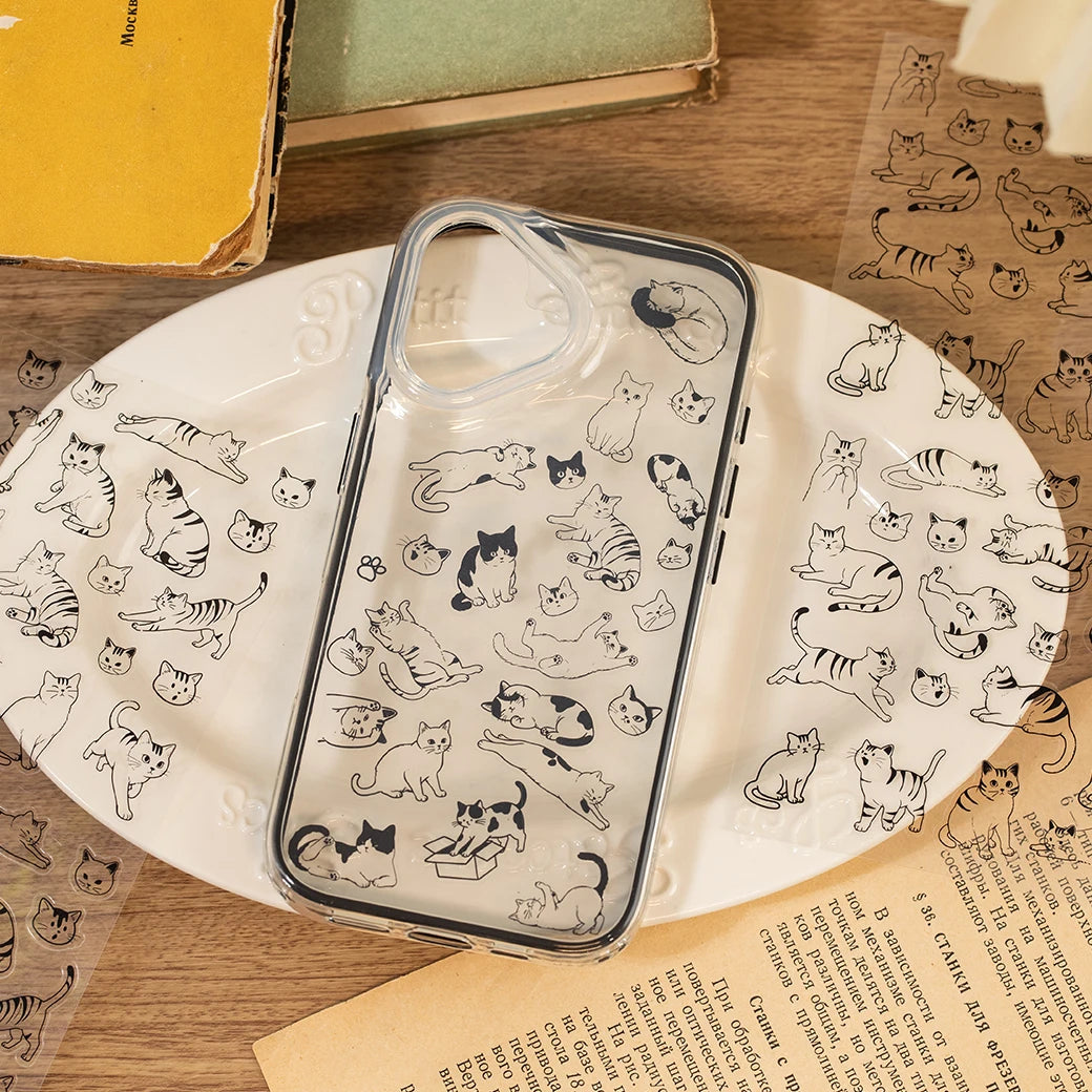 Cute cartoon cat PET stickers on a phone case, perfect for DIY scrapbooking, photo frames, and craft decorations.