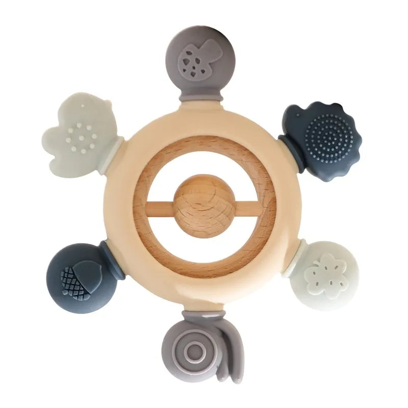 Multi-colored silicone and natural wood baby teething ring toy for infant pain relief.