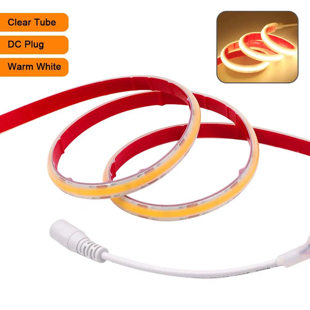 Flexible waterproof LED strip light, clear tube, red backing, DC plug on lead cable
