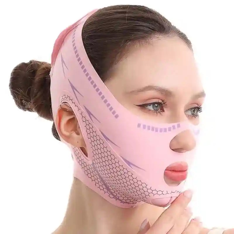 A woman wearing a light pink, neoprene V-line lifting strap with a geometric honeycomb pattern and ear cutouts.
