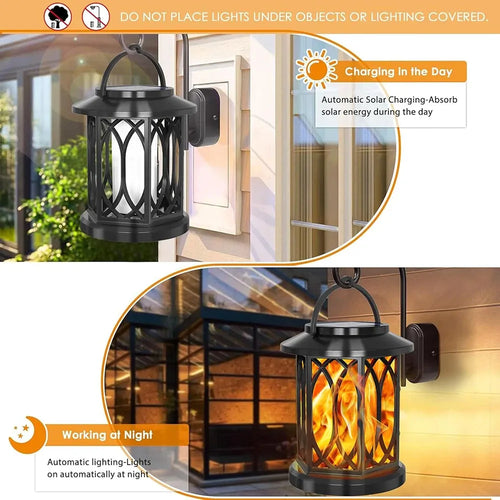 Black hexagonal solar lantern hanging on an outdoor wall, showing day charging and night flame effect.