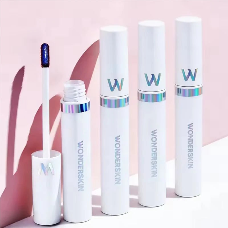 Wonderskin peel-off lip stain tubes in white packaging with holographic applicators and long-lasting pink tint formula.
