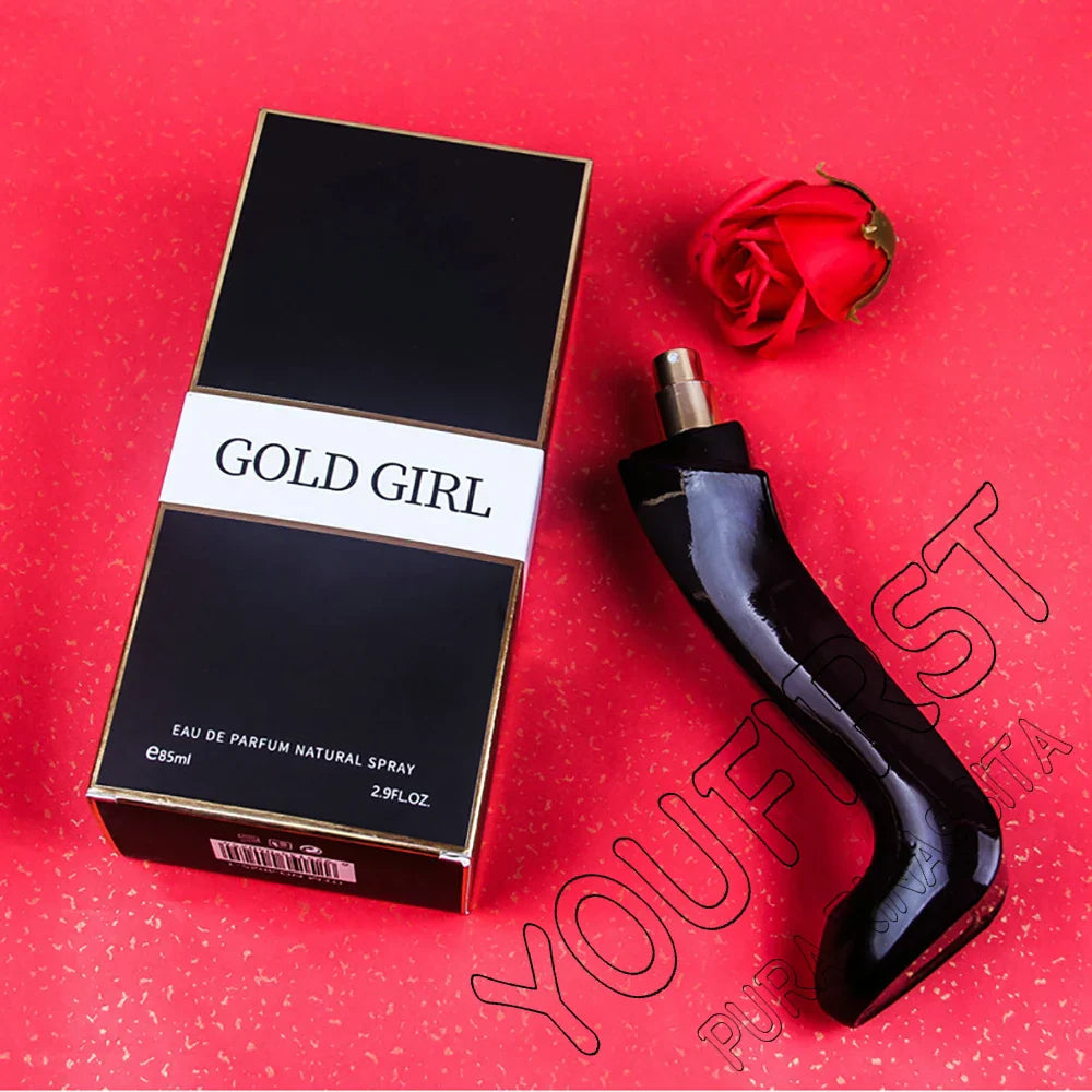 Gold Girl Eau de Parfum for women. Elegant stiletto-shaped bottle, long-lasting floral fragrance in a luxury black box.