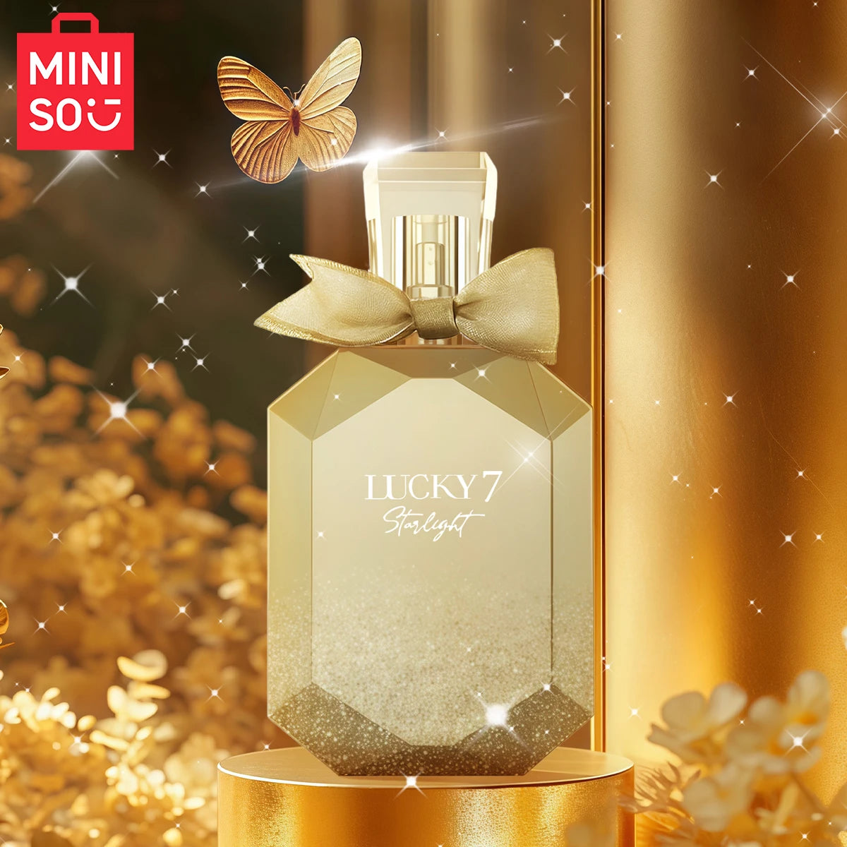 MINISO Lucky 7 Starlight EDP for women. Luxury floral perfume in a gold gem-shaped bottle with a bow. 100ml fragrance.
