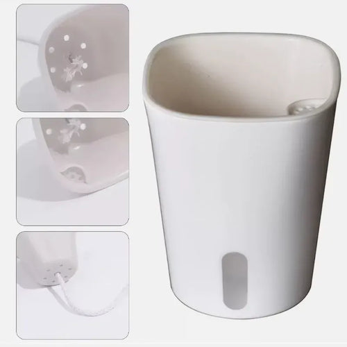 White self-watering plant pot with oval water-window opening