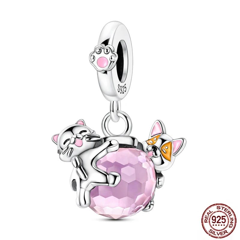 Cute 925 sterling silver pet charm with cat and dog holding a pink crystal bead for DIY charm bracelets.
