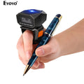 Wearable barcode scanner ring on hand, black body with blue window and orange button.