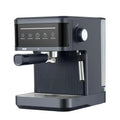 Compact dark grey espresso machine with touch control panel, steam wand, and removable water tank.
