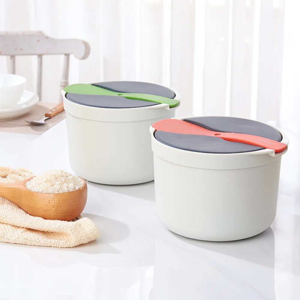 Microwave rice cooker steamer pot set, two white containers with gray vented lids and orange/green