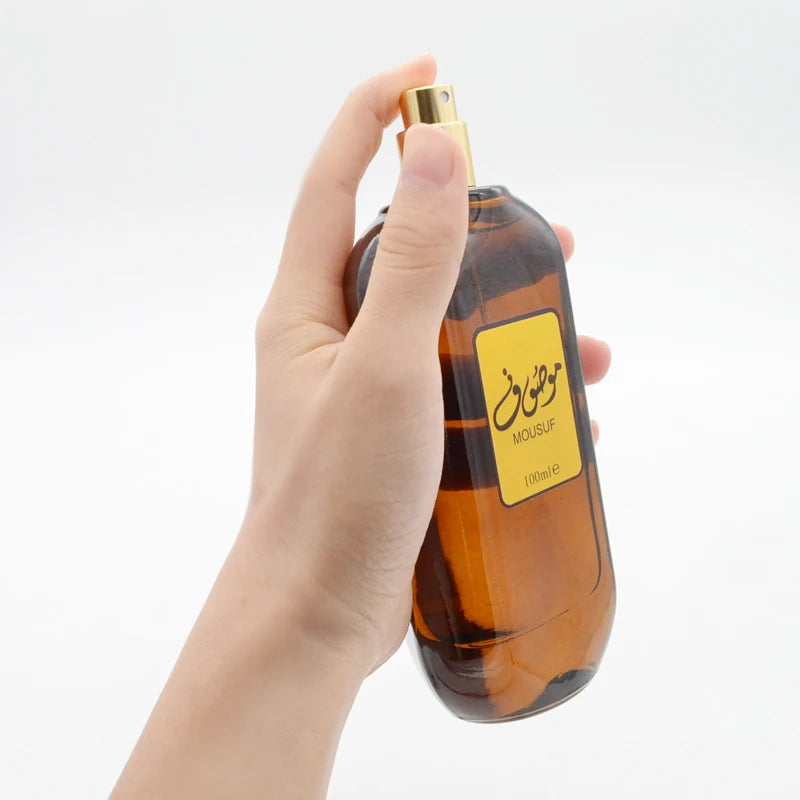 Mousuf Intense Arabian 100ml EDP spray for men & women. Amber bottle with yellow label, sweet, musk unisex fragrance.