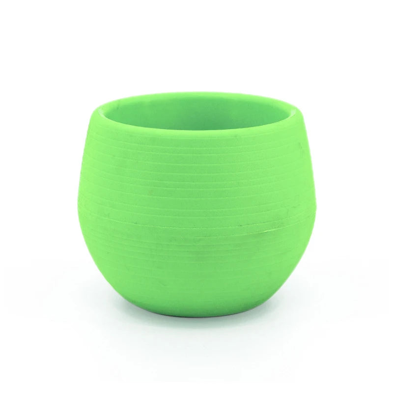 Mini plastic flower pot with round shape in green