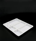 White plastic rectangular partitioned tray with textured base, used for organizing small parts or hardware components.