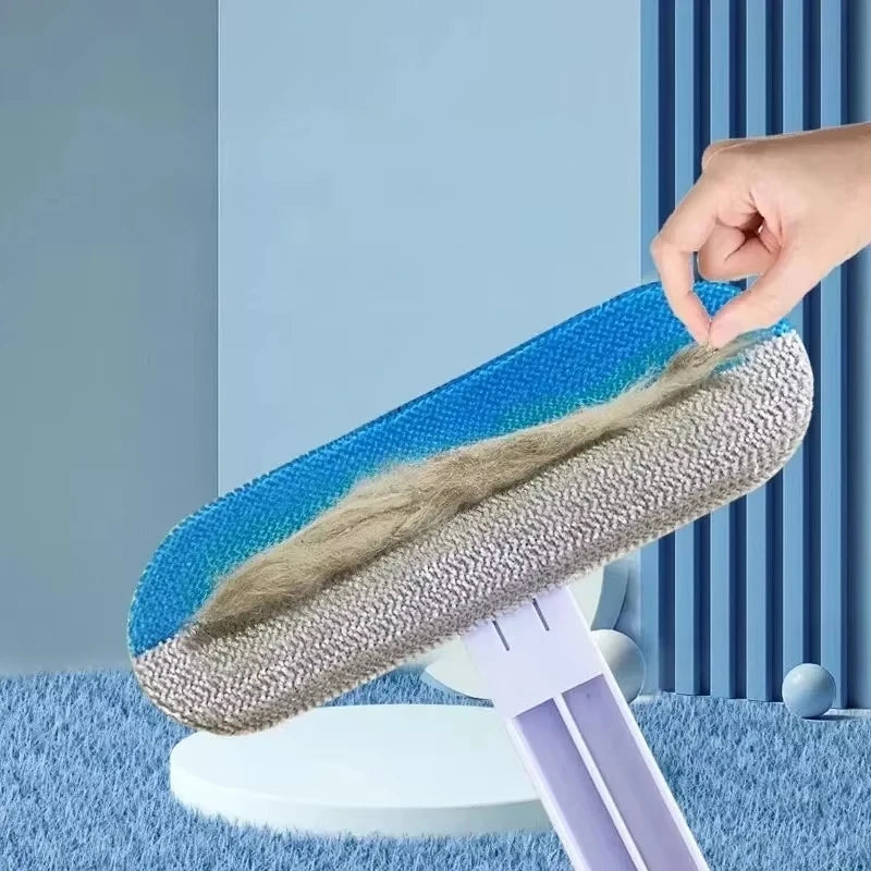 Manual blue lint brush removing pet hair from carpet, perfect for easy dog and cat fur cleaning on furniture and beds.
