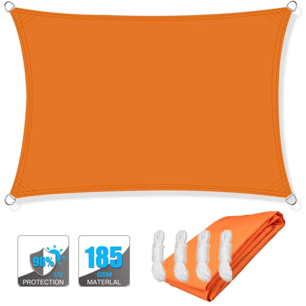 Orange rectangle sun shade sail canopy with corner grommets and folded matching fabric.