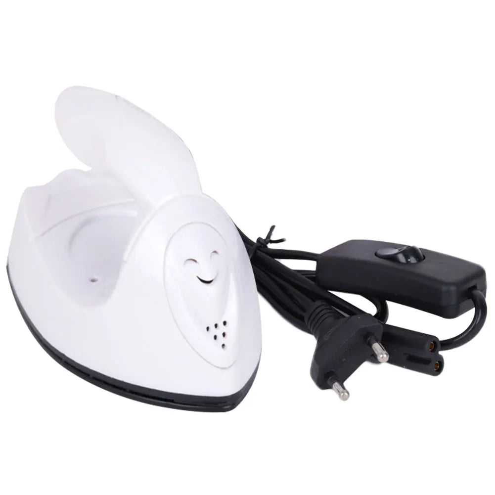 Tidesmit portable handheld mini iron showing ergonomic handle and heating plate for DIY craft and sewing projects