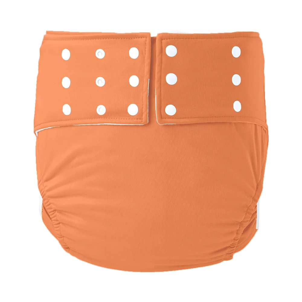 Reusable cloth baby diaper in solid burnt orange with white snap closures for adjustable fit.