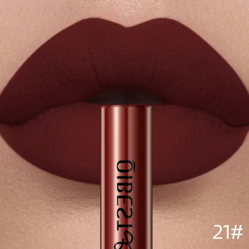 QIBEST deep red velvet matte liquid lipstick on lips for a long-lasting, nonstick, professional makeup finish.