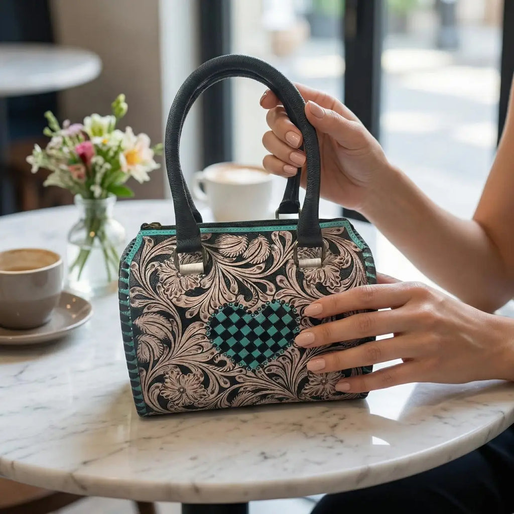 Luxury genuine leather mini duffel trunk with floral pattern, teal checkered heart, and black double handles.