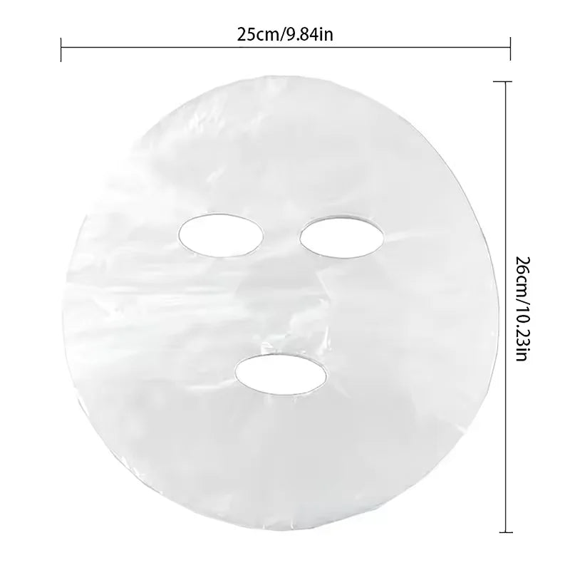 Clear, circular plastic face mask sheet with cutouts for eyes and mouth, labeled with 25cm by 26cm dimensions.