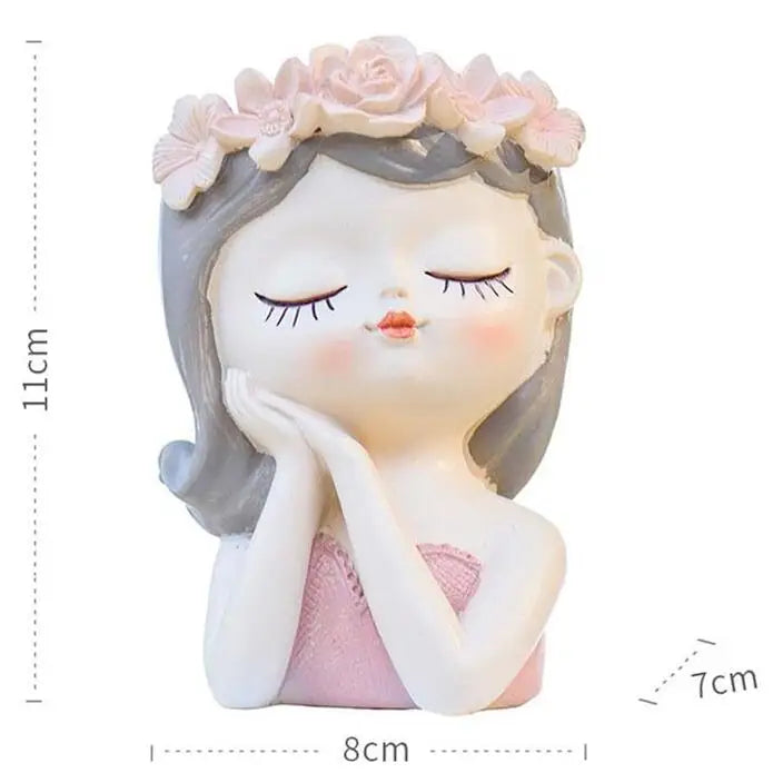 Sitting girl-face succulent planter holding face, pink flowers on head