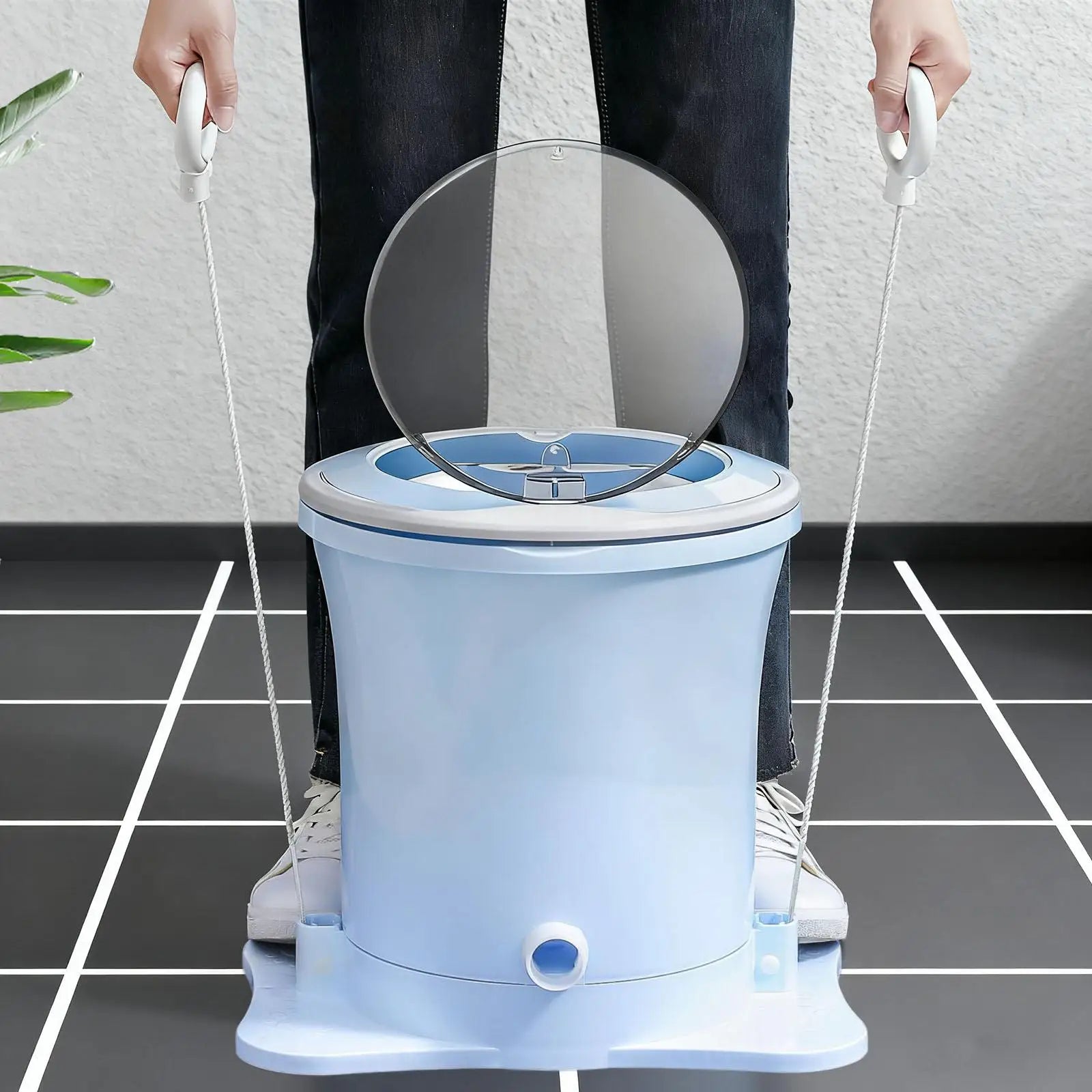 Tidesmit portable laundry dryer showing compact foldable design and internal heat settings for apartment travel use