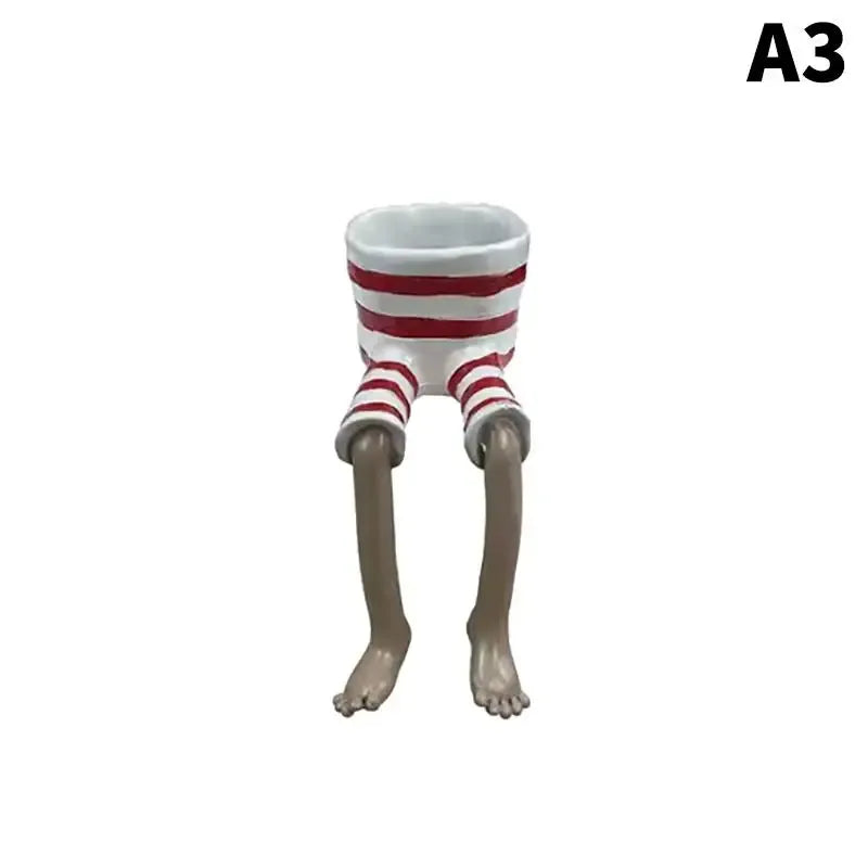 White-and-red striped leggy resin planter with bent gray legs and bare feet