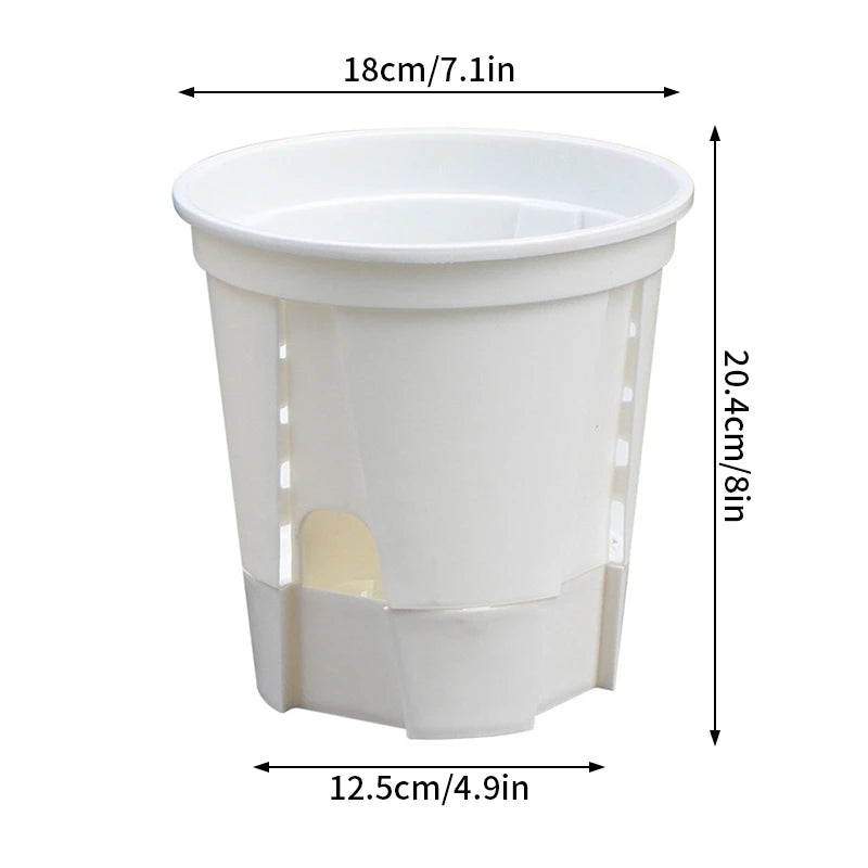 Self-watering double-layer plastic flowerpot, white translucent with inner reservoir.