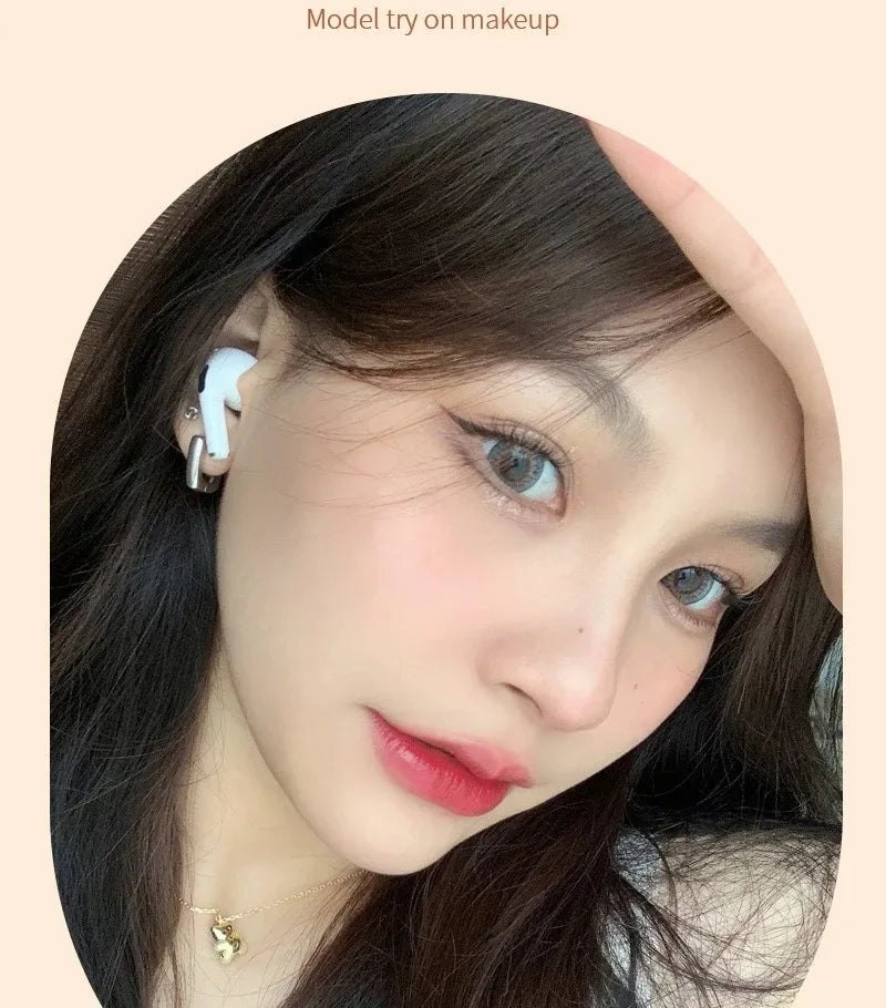 Model wearing glossy, moisturizing Korean mirror-finish red lip glaze for a plump, jelly-like water light lip effect.
