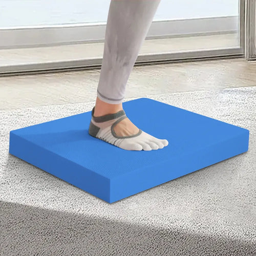 Yoga balance pad, thick foam exercise cushion for balancing in our smart yoga mats collection, blue studio view.