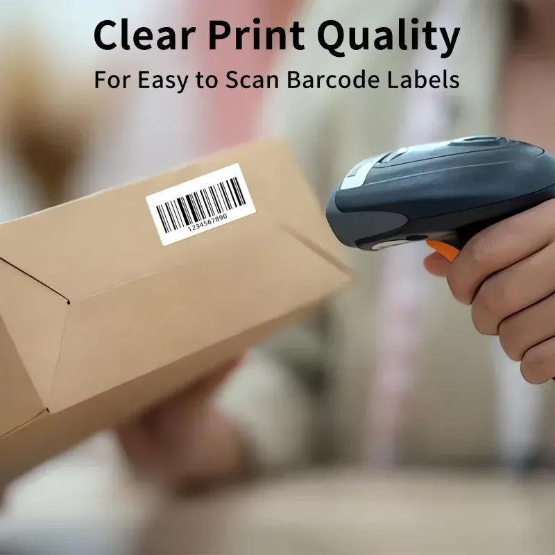 White label adhered to a cardboard box while a handheld scanner reads a barcode