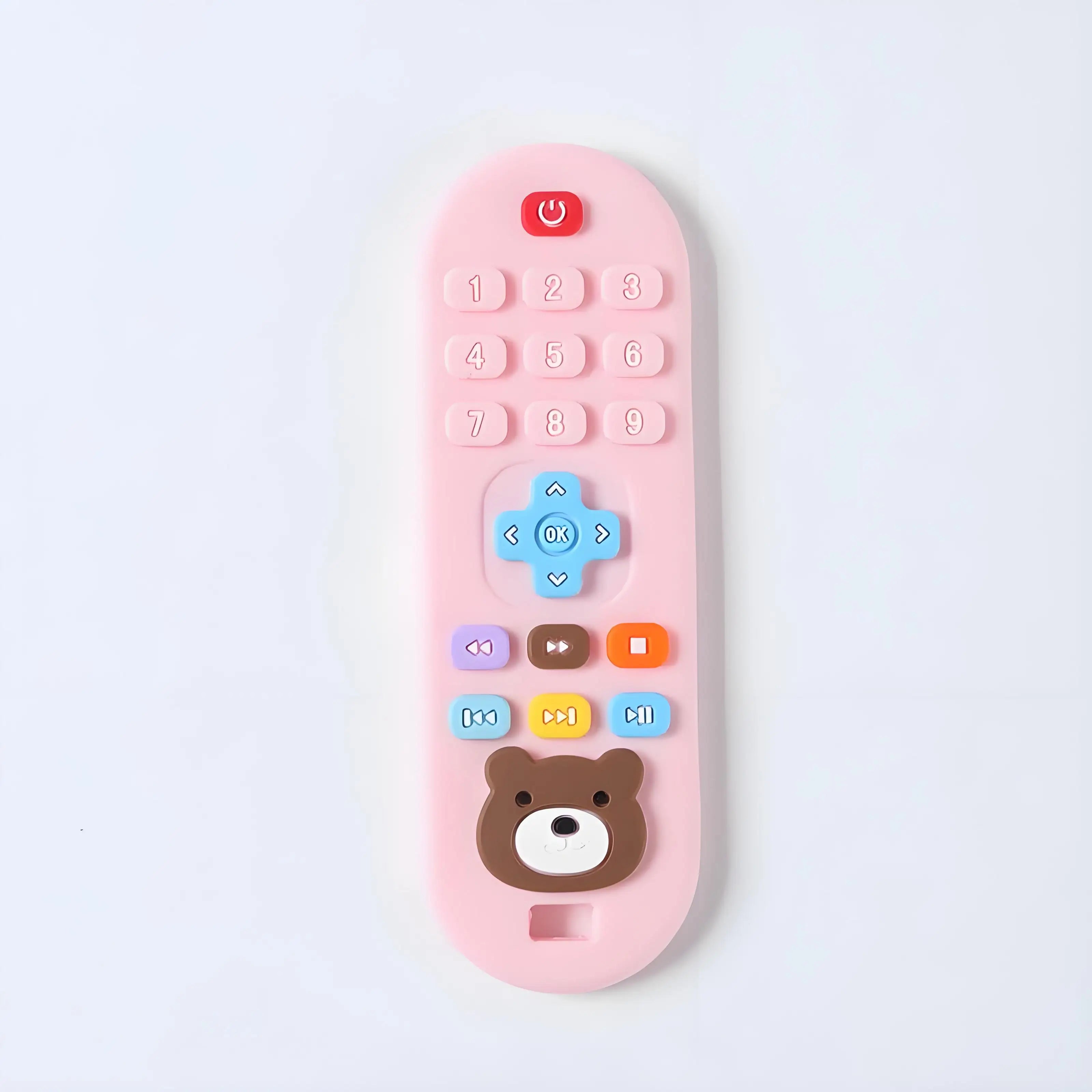 Pink silicone baby teething toy shaped like a remote control with a brown bear face.