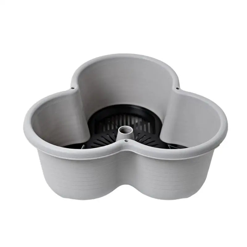 Grey plastic vertical tower planter with three-lane openings and central drain tube