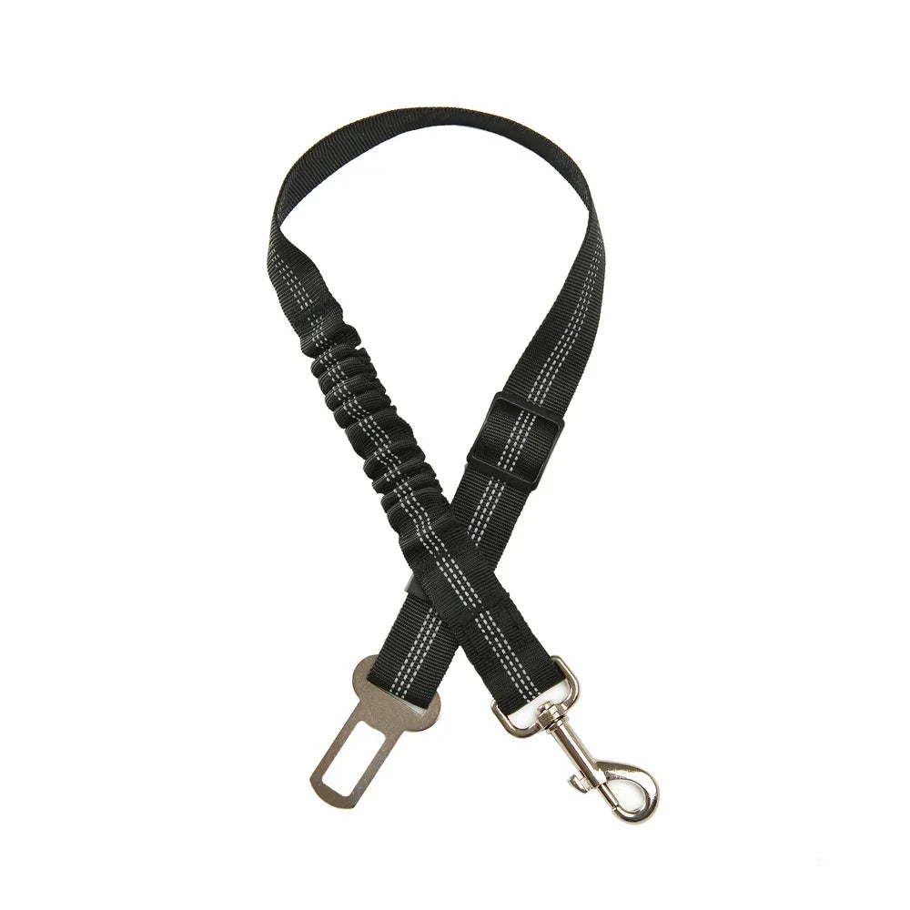 Adjustable black reflective dog car seat belt with elastic shock-absorbent tether for safe pet travel.