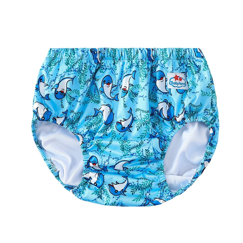 Babyland reusable swim diaper for babies featuring a blue shark and seaweed pattern on a light blue background.