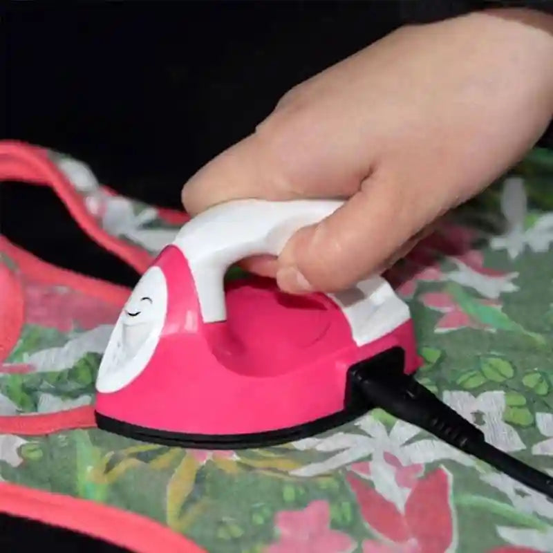 Tidesmit heat transfer iron for applying vinyl to t-shirts, shoes, bags, and hats, front view.