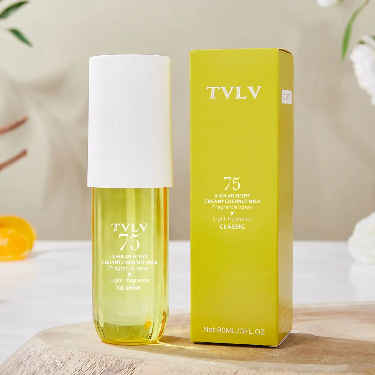 TVLV 75 Coconut Milk long-lasting Brazilian alcohol-free perfume spray in a minimalist cylindrical bottle for parties.