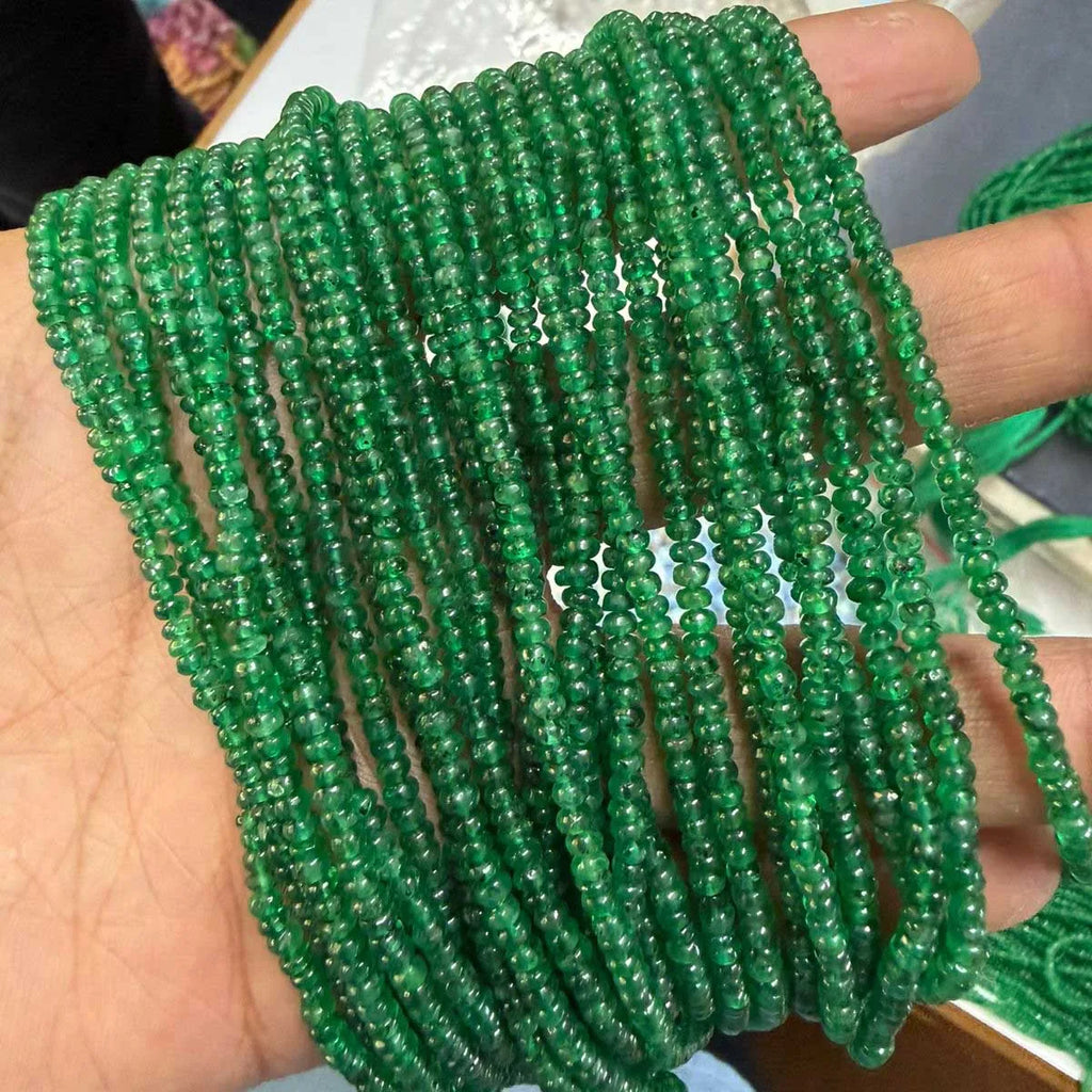 Green smooth rondelle gemstone bead strand with closely spaced beads