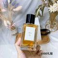 Black Tie Paris perfume in a rectangular glass bottle with a black cap, filled with amber-colored fragrance.
