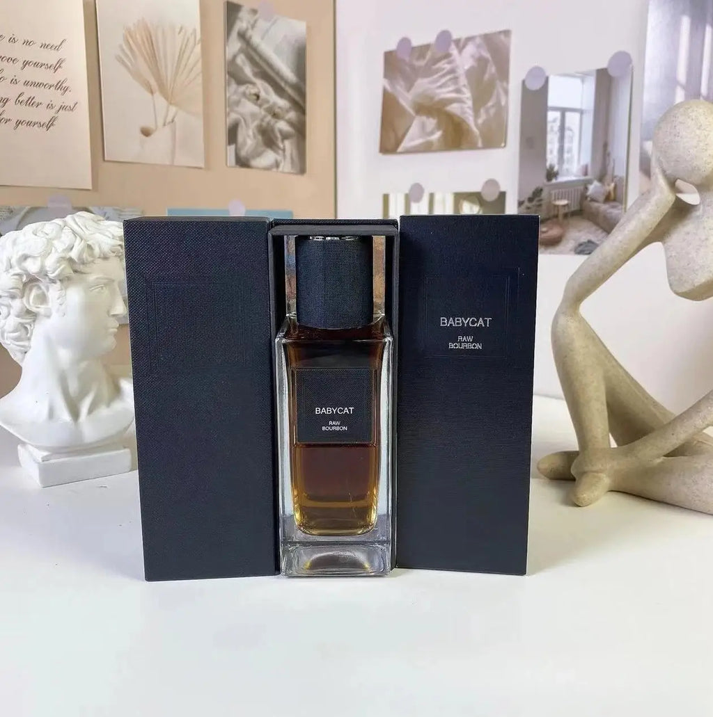 Babycat Raw Bourbon 125ml unisex oriental woody perfume. Rectangular glass bottle, long-lasting floral fragrance.