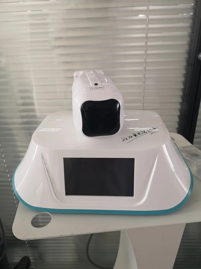 Portable 576 points Liposonic slimming machine, white desktop fat reduction device with LCD screen for body tightening.
