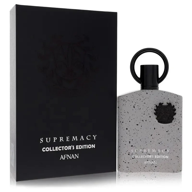 Supremacy Collector's Edition perfume in a speckled grey bottle with a black ring cap and matching black display box.