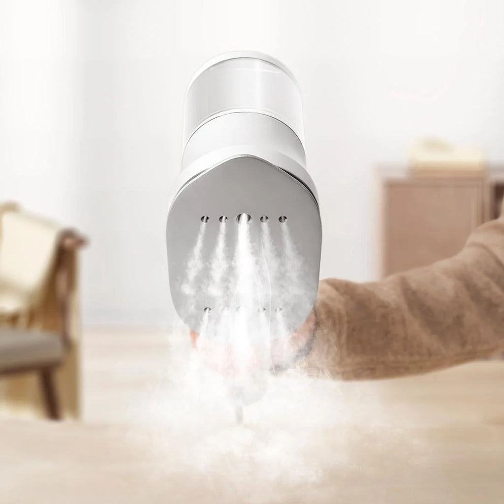 Tidesmit portable handheld garment steamer for clothes showing ergonomic handle and vertical steam nozzle design.
