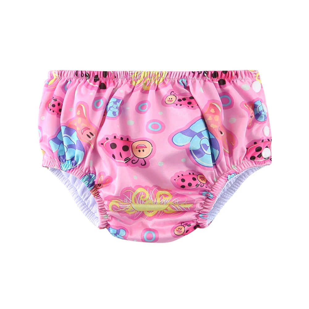Pink baby swim diaper with ladybug and snail print, featuring adjustable side snap closures for babies.