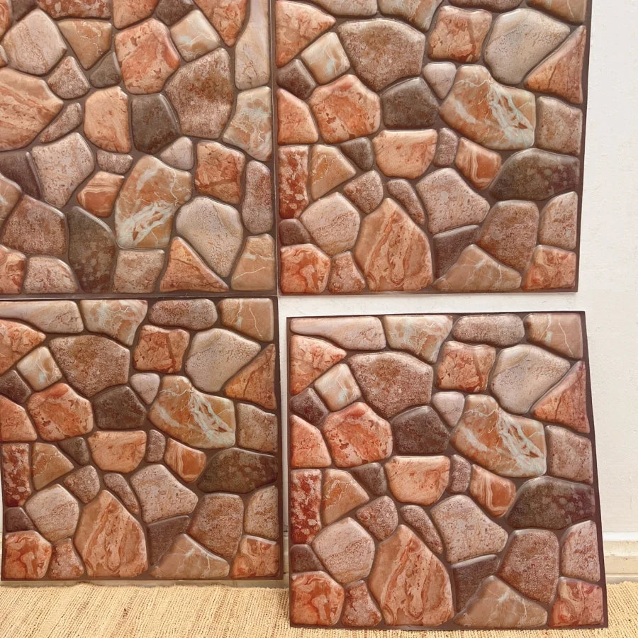 Peel-and-stick faux stone backsplash tile sheets with warm orange and tan brick look