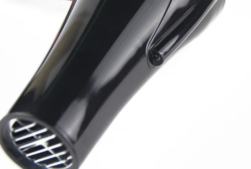 Glossy black professional 2100W hair dryer with metallic front grille for salon-quality blowouts.