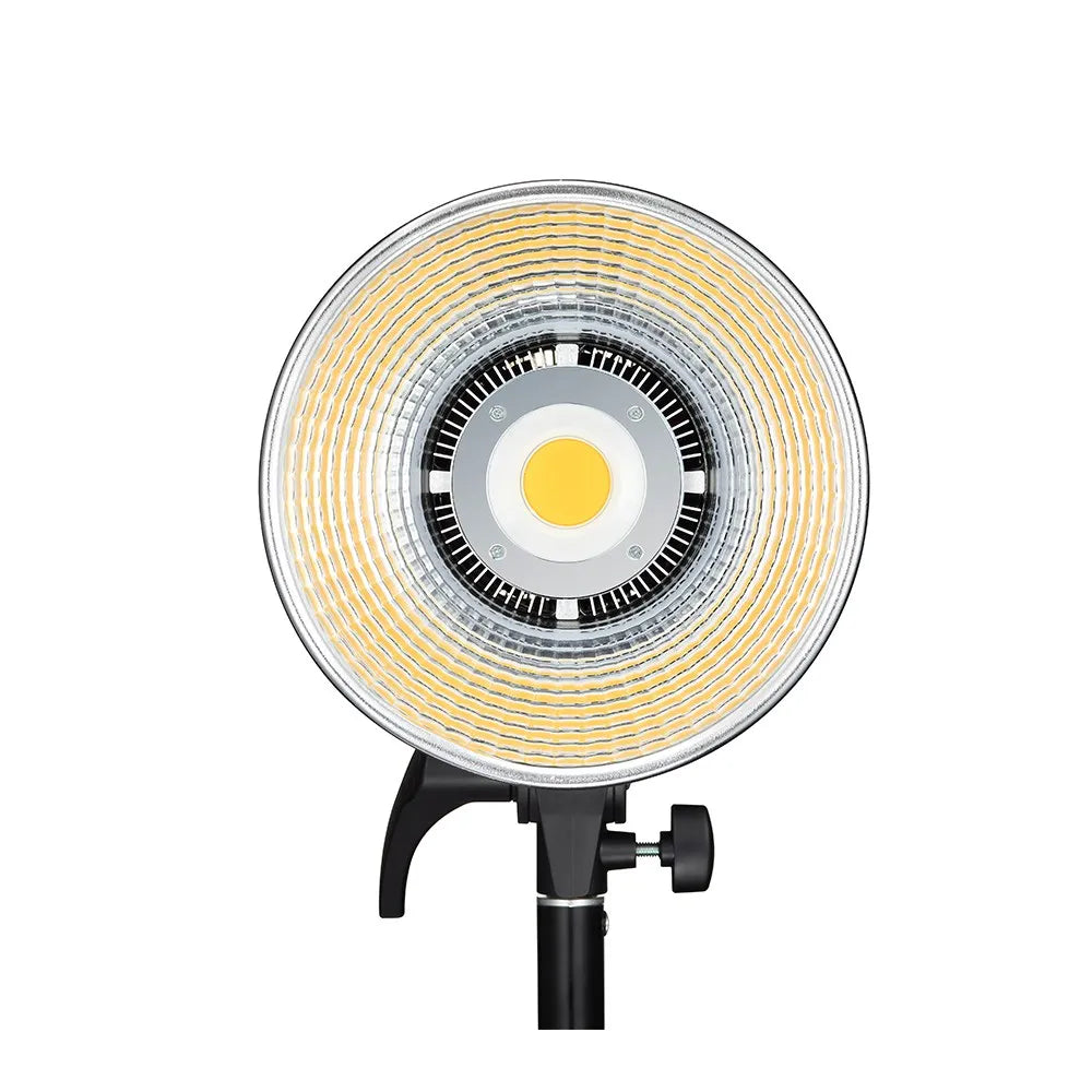 Round COB LED studio light with textured silver reflector and center lens on a black adjustable mounting bracket.