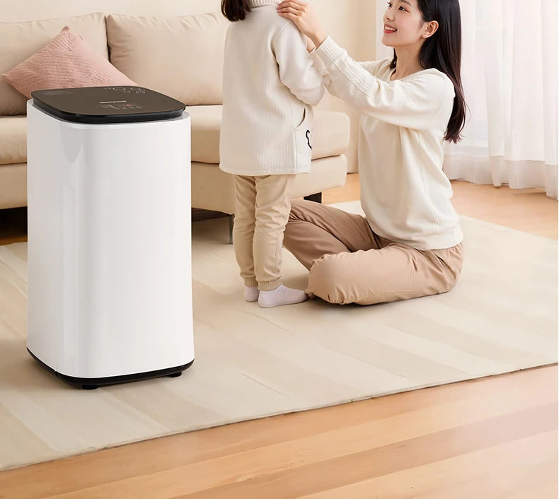 Tidesmit 60L automatic clothes dryer with baby disinfection feature and air-drying cycle for compact laundry care